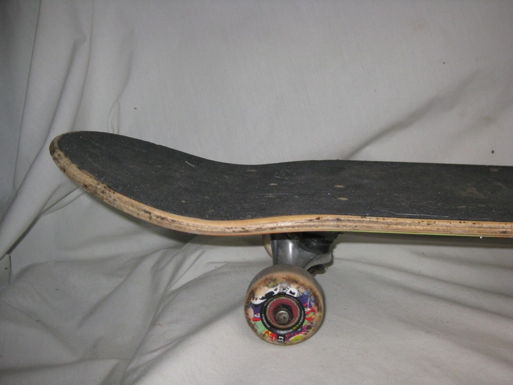 pre-owned skateboard Tensor trucks Psychedelic wheels Blind grim reaper deck