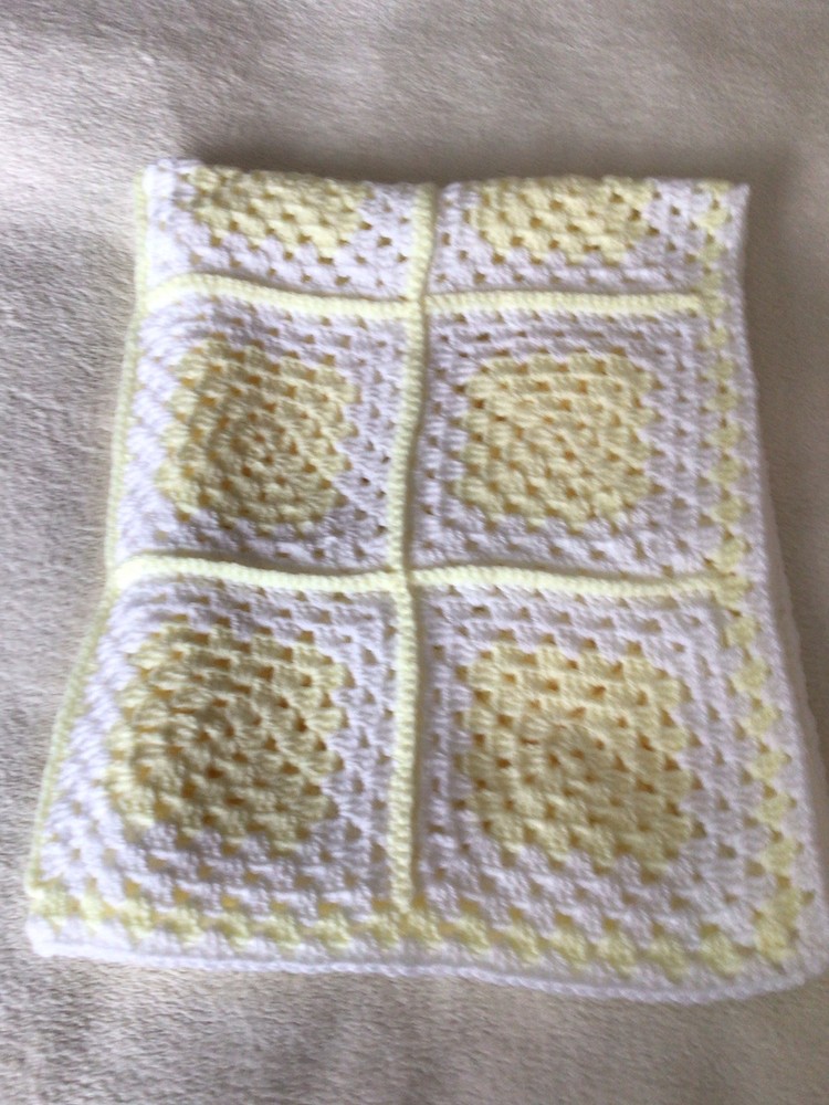 Crocheted Granny Square Cot Blanket