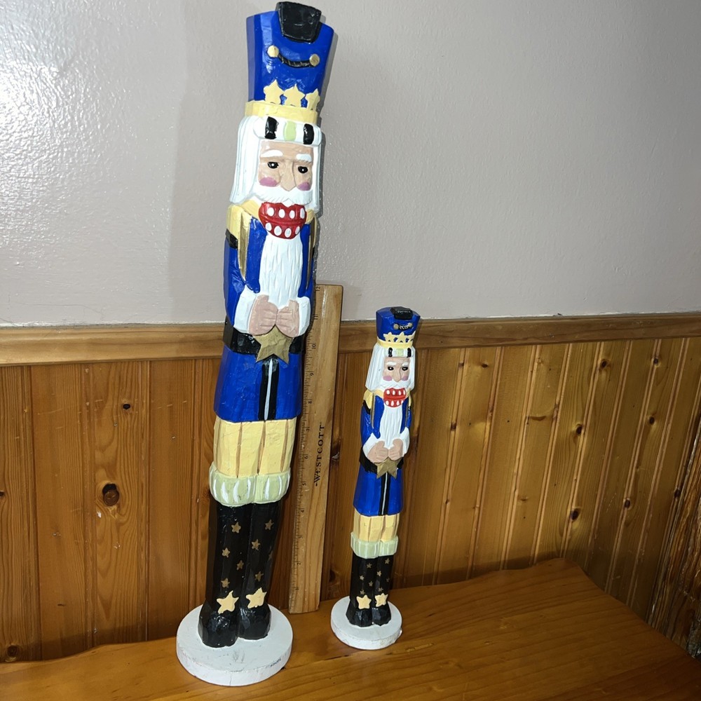 2 Tall decorative nutcracker figurines