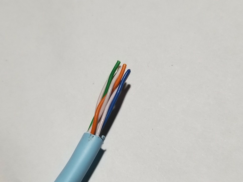 Commscope 1061C 24/4P Cat5E UTP Systemax PowerSUM Network Cable Light Blue/100ft