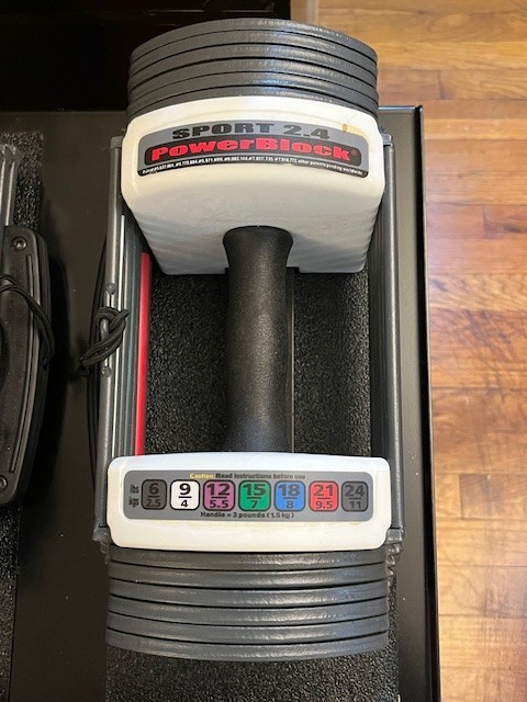 Powerblock adjustable dumbbell pair with folding stand