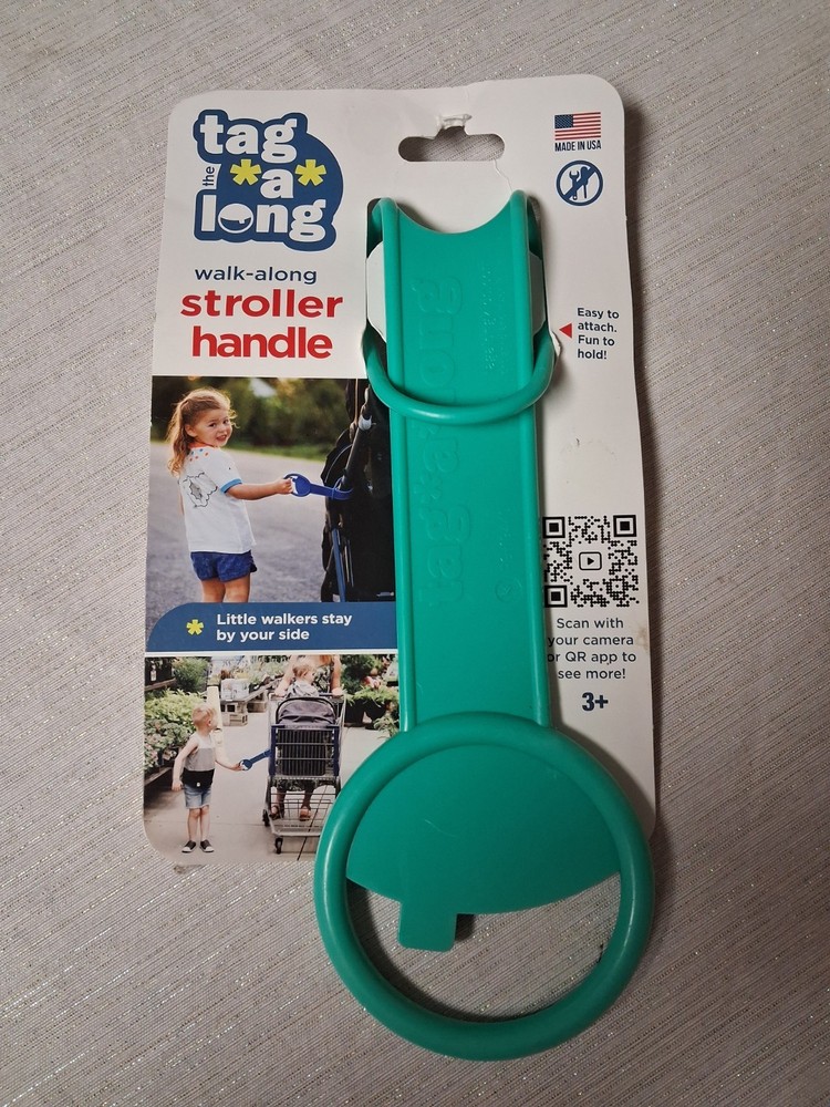 A tag A Long Stroller Handle Perfect For That Extra Little One