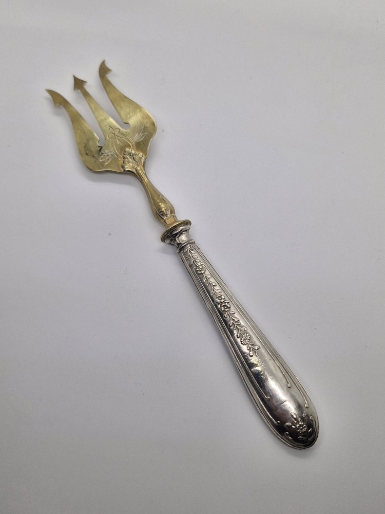 Vintage Antique brass fork with silver handle