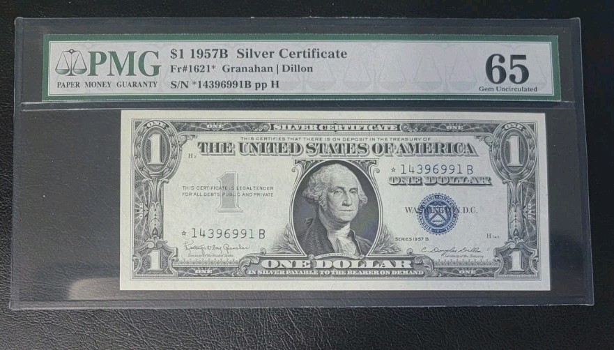 $1 1957B Silver Certificate Star Note PMG 65 GEM UNCIRCULATED