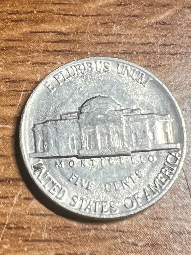 1982 ERROR JEFFERSON NICKEL STRUCK THROUGH AN OBJECT