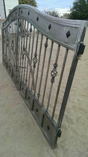 wrought iron driveway entry gate