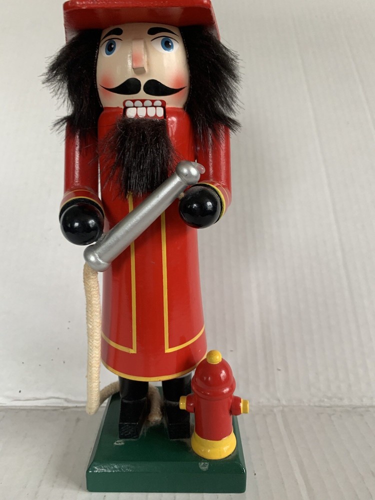 Wooden Fireman with Firehose & Fire Hydrant Nutcracker 10 In Tall
