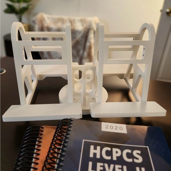 White Plastic Rotating Medical Coding Books Holder